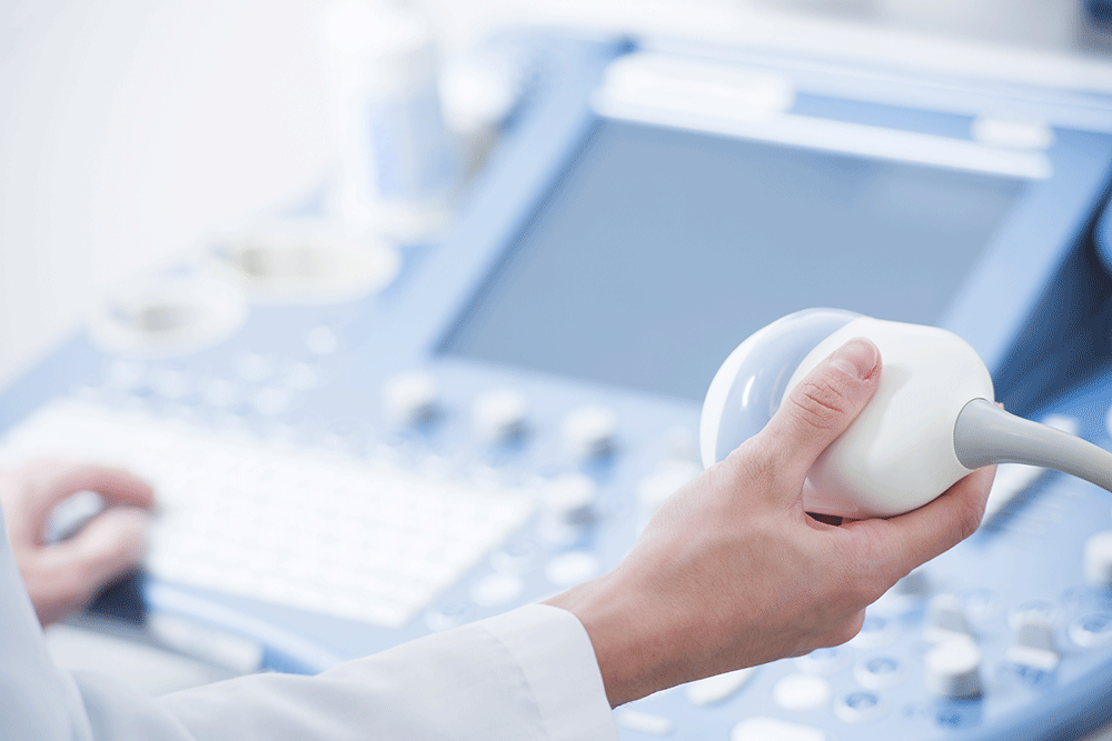 young-woman-doctors-hands-close-up-preparing-for-an-ultrasound-device-scan_large